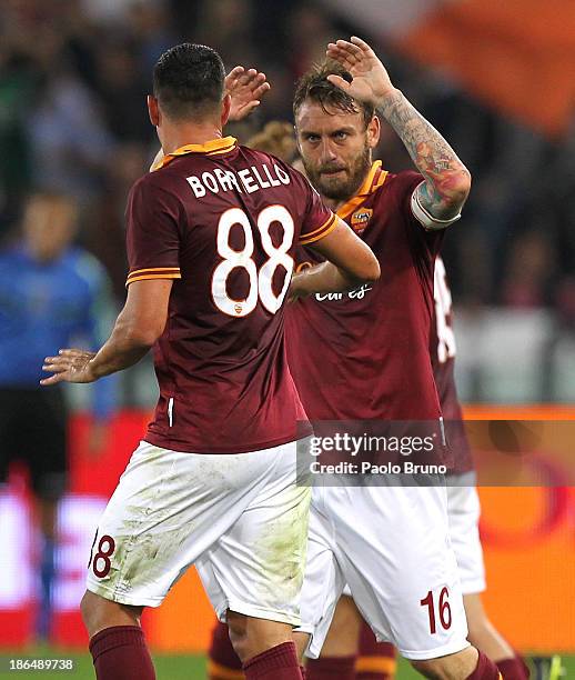 Marco Borriello of AS Roma celebrates after scoring the opening goal with his team mate Daniele De Rossi during the Serie A match between AS Roma and...