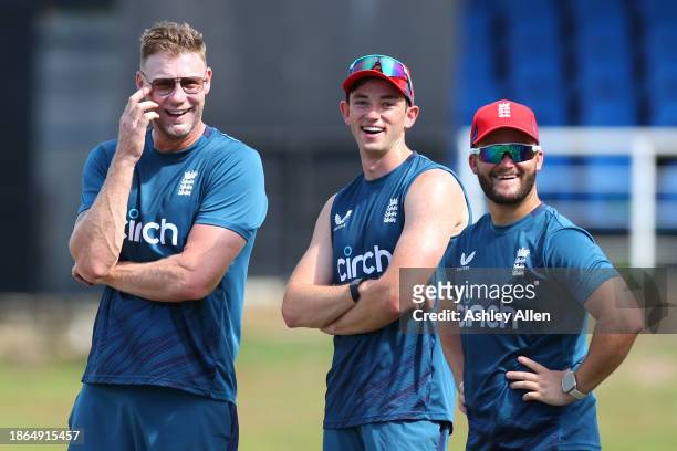 Assistant coach Andrew Flintoff , and players, John Turner and Ben Duckett of England look on during an England Net Session ahead of the 4th T20...