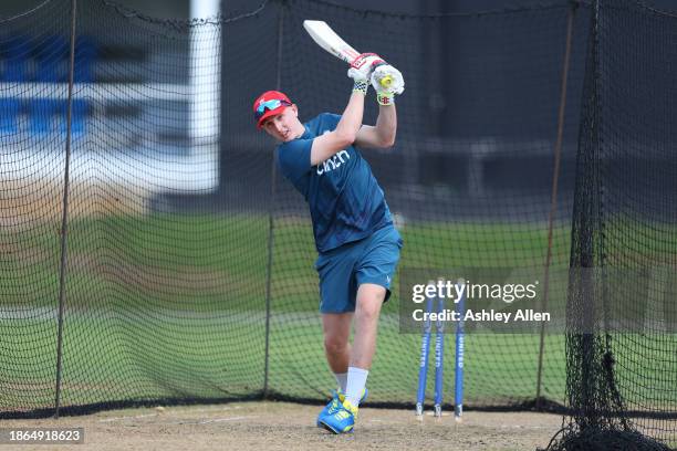 Harry Brook of England practices range-hitting during an England Net Session ahead of the 4th T20 International at Queens Park Oval on December 18,...