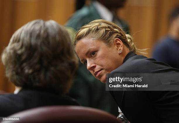 Jackie Garcia Haley, girlfriend of Sean Taylor, talks to attorney Reid Rubin in court as the jury deliberates the fate of Eric Rivera, Jr., who is...