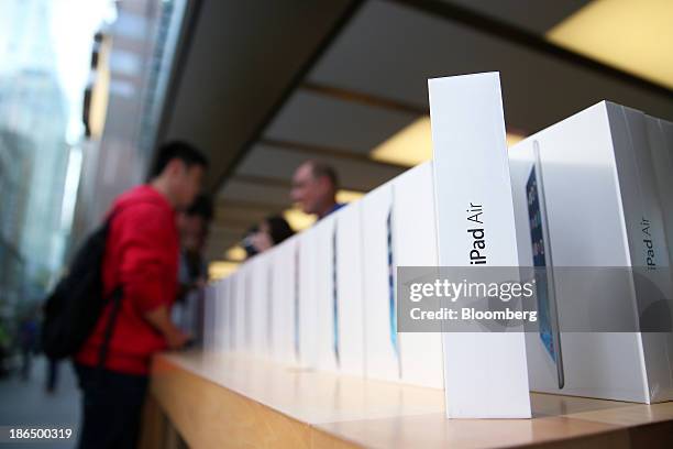 Apple Inc. IPad Air boxes are displayed at the company's George Street store in Sydney, Australia, on Friday, Nov. 1, 2013. Apple Inc.'s forecast for...