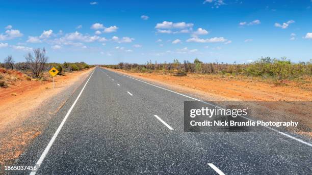 the outback, australia. - bitumen stock pictures, royalty-free photos & images