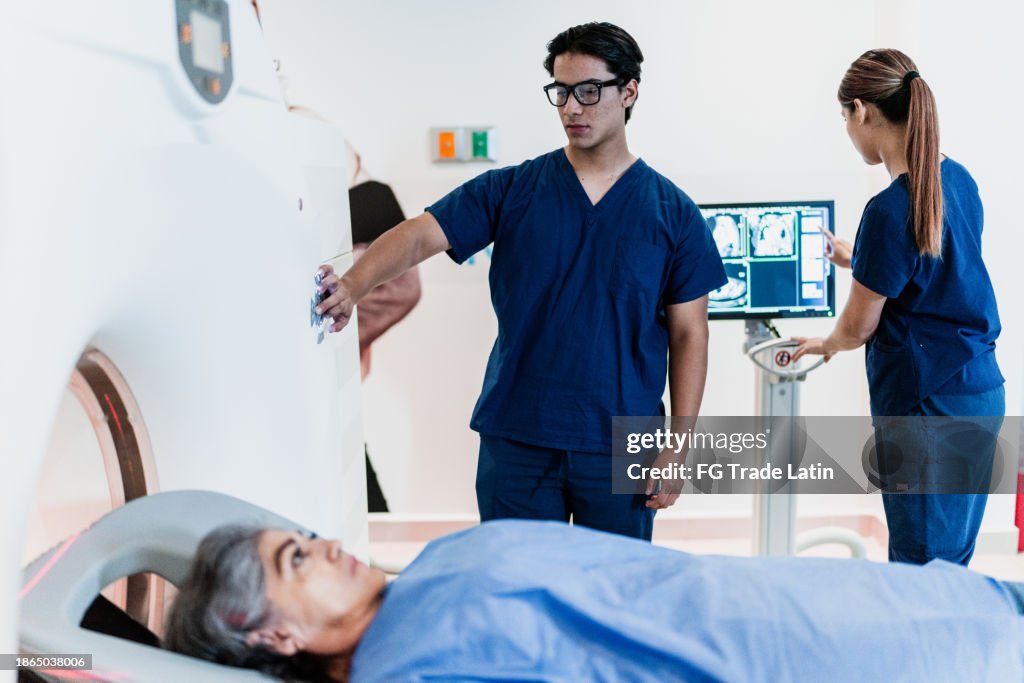 Senior woman on a tomography exam at hospital