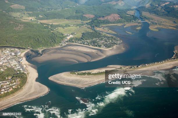 Aerial view of subaqueous bedforms and dunes at entrance to Siletz Bay estuary, Oregon coast near Lincoln City. Siletz River in background. Salishan...
