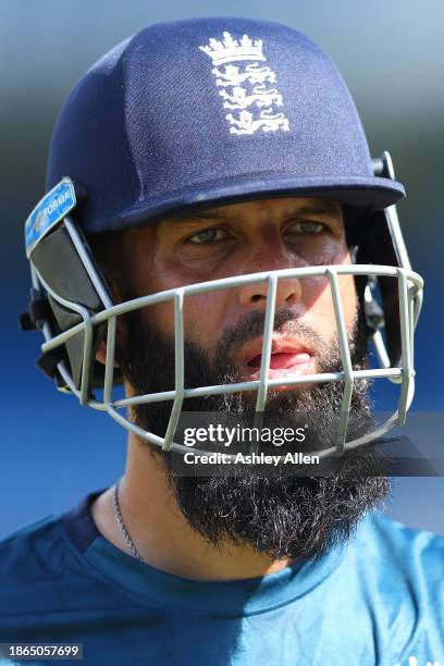 Moeen Ali of England looks on during an England Net Session ahead of the 4th T20 International at Queens Park Oval on December 18, 2023 in Port of...