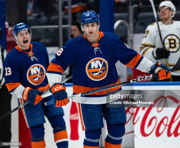 Alexander Romanov of the New York Islanders celebrates his second period goal during a game against the Boston Bruins at UBS Arena on December 15,...