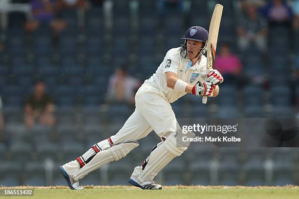 Scott Henry of the Blues bats during day three of the Sheffield Shield match between the New South Wales Blues and the Tasmania Tigers at Blacktown...