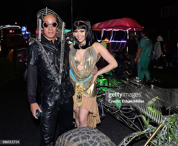 Henry Chang , driver of the MisterFusion Artcar, and model and parade queen Claire Sinclair attend the fourth annual Las Vegas Halloween Parade on...