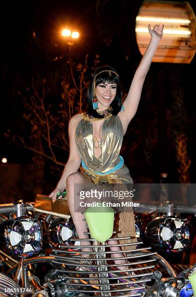 Model and parade queen Claire Sinclair rides in the MisterFusion Artcar during the fourth annual Las Vegas Halloween Parade on October 31, 2013 in...