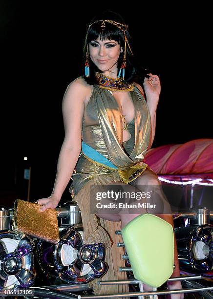 Model and parade queen Claire Sinclair rides in the MisterFusion Artcar during the fourth annual Las Vegas Halloween Parade on October 31, 2013 in...