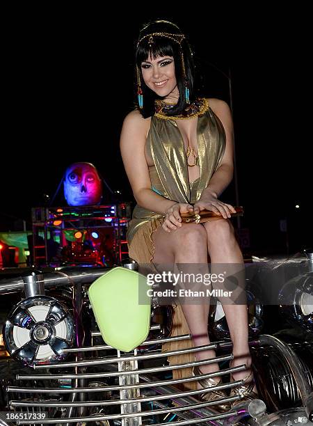 Model and parade queen Claire Sinclair rides in the MisterFusion Artcar during the fourth annual Las Vegas Halloween Parade on October 31, 2013 in...