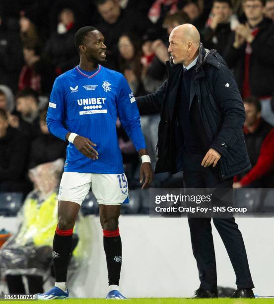 Rangers' Abdallah Sima and manager Philippe Clement during the Viaplay Cup Final match between Rangers and Aberdeen at Hampden Park, on December 17...