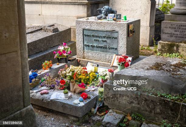 Flowers and momentos placed on the grave of Jim Morrison, the singer and frontman of the famous band The Doors, who died in Paris aged 27 in 1971....