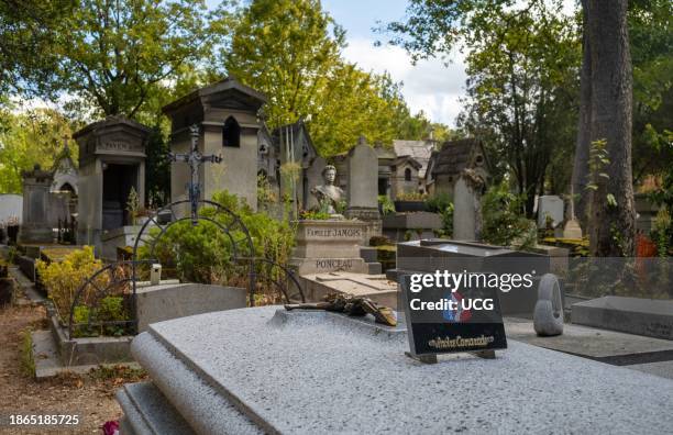 Tomb in Pere Lachaise Cemetery, Paris, France, with an FNACA plaque for a former French military veteran of colonial wars in Algeria, Tunisia and...