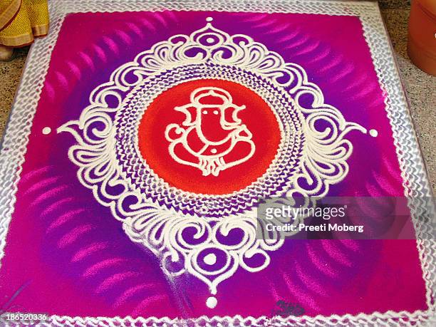 ganpathi rangoli designs in sand - rangoli stock pictures, royalty-free photos & images