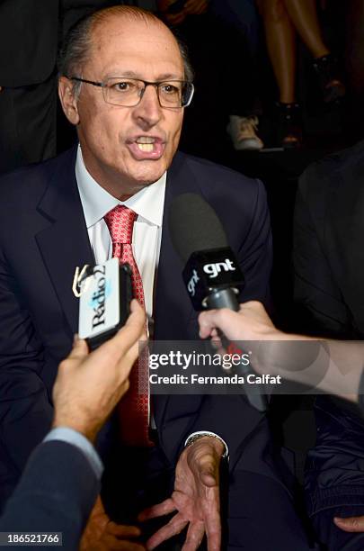 Governor of the State of Sao Paulo, Geraldo Alckmin attends the Colcci show at Sao Paulo Fashion Week Winter 2014 on October 31, 2013 in Sao Paulo,...