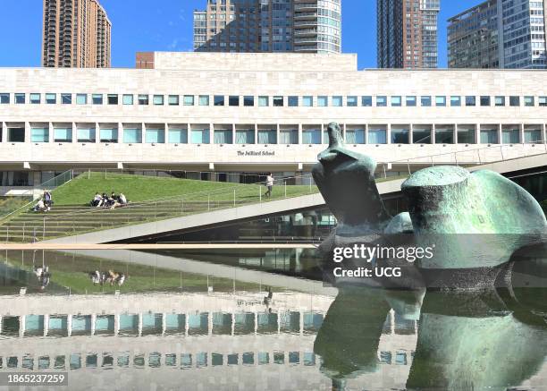 Located near the entrance of Lincoln Center Film Society and across the street from Julliard is a unique grass covered roof called the Hypar...