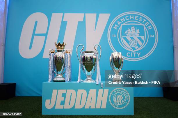 View of the Premier League Trophy, Champions League Trophy and the UEFA Super Cup trophy during a Manchester City training session at King Abdullah...