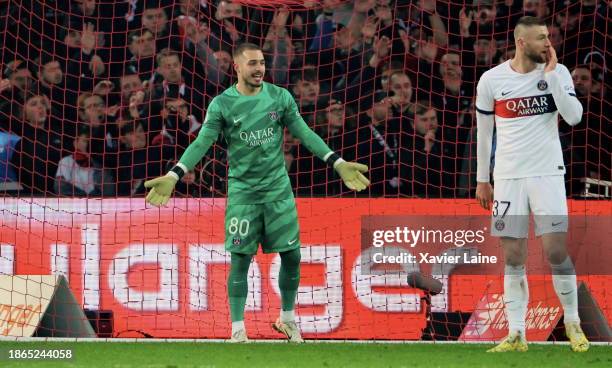 Arnau Tenas of Paris Saint-Germain is dissapointed with Milan Skriniar during the Ligue 1 Uber Eats match between Lille OSC and Paris Saint-Germain...