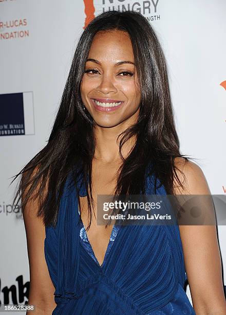 Actress Zoe Saldana attends Share Our Strength's No Kid Hungry dinner at Ron Burkle's Green Acres Estate on October 29, 2013 in Beverly Hills,...