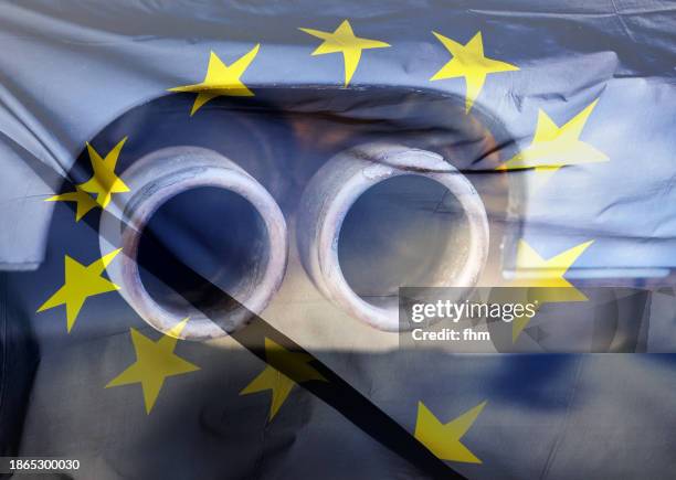 exhaust pipes of a car with eu-flag overlay - fumes stock pictures, royalty-free photos & images