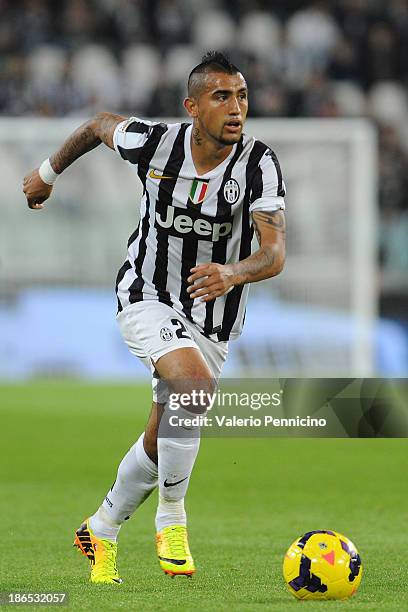 Arturo Vidal of Juventus in action during the Serie A match between Juventus and Catania Calcio at Juventus Arena on October 30, 2013 in Turin, Italy.