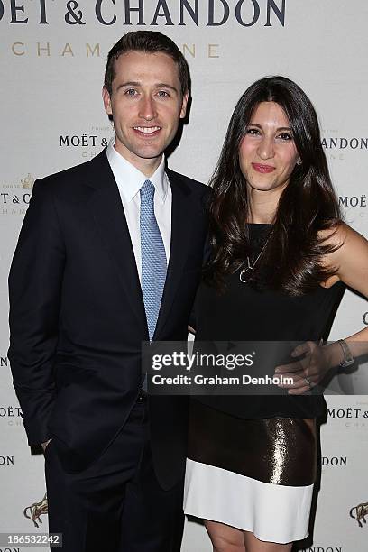 Tom Waterhouse and Hoda Vakili pose at the Moet & Chandon Derby Eve party held at The Waiting Room, Crown Towers on November 1, 2013 in Melbourne,...