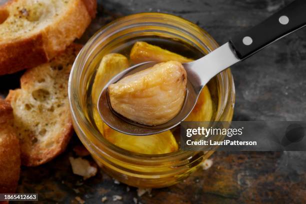 garlic confit - confit stock pictures, royalty-free photos & images