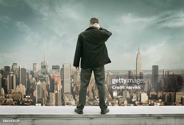 man on the edge - suicide stock pictures, royalty-free photos & images