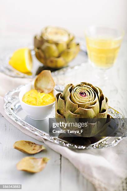 artichoke with homemade aioli - artichoke stock pictures, royalty-free photos & images