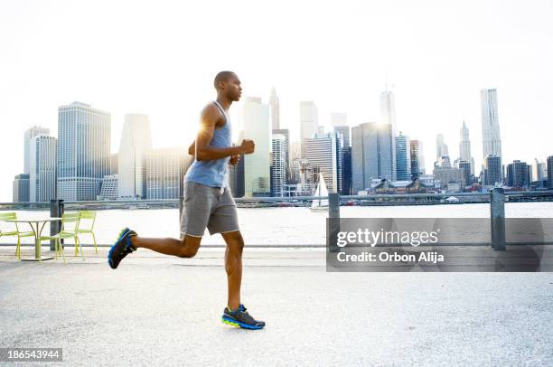 Running Single Man One Man Running New York City Photos and Premium High Res Pictures ...