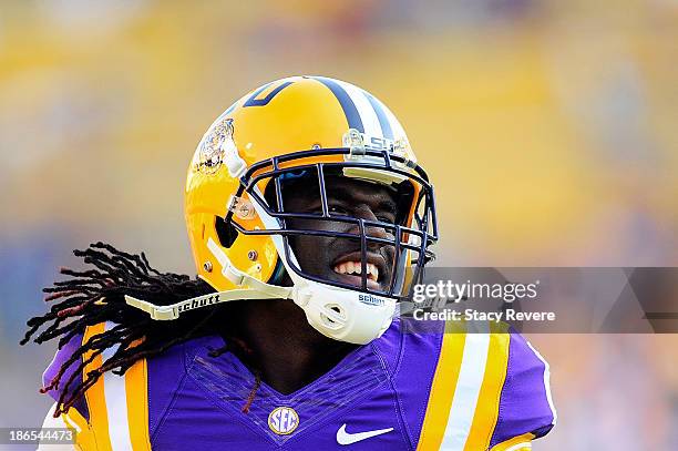 Craig Loston of the LSU Tigers participates in pregame drills prior to a game at Tiger Stadium against the Furman Paladins on October 26, 2013 in...