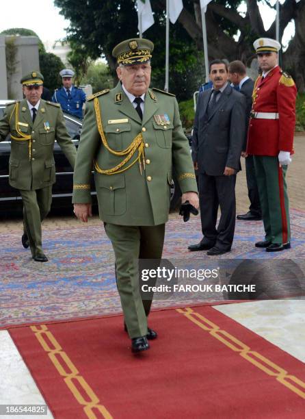 Algerian chief of staff General Ahmed Gaid Salah arrives at the People's Palace in the capital Algiers on November 1, 2013 as he attends a ceremony...