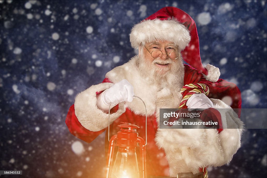 Pictures of Vintage Real Santa Claus carrying gift sack