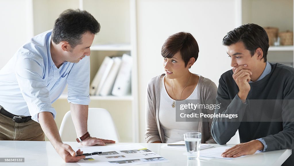 Going over stacks of paperwork