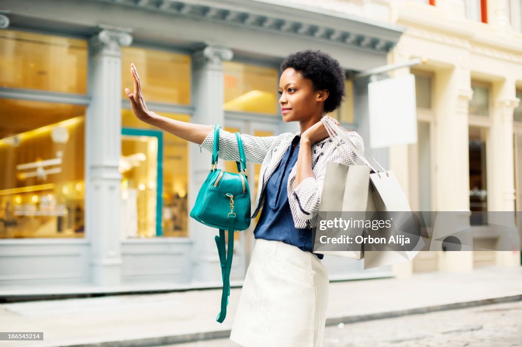 Woman with shopping bags in New York