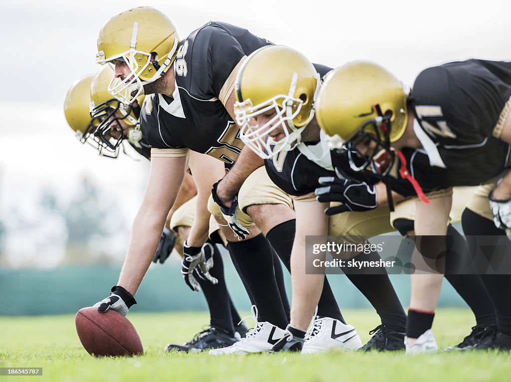 American football players lining up.