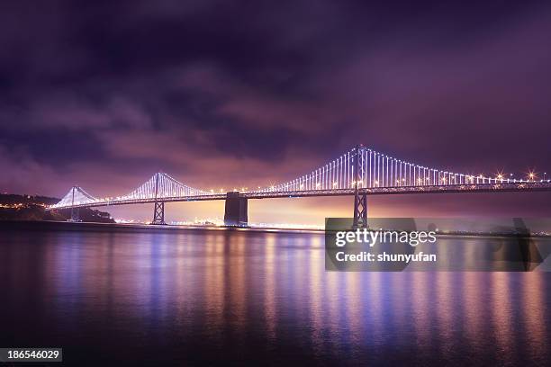 san francisco: bay bridge from embarcadero - little italy stock pictures, royalty-free photos & images