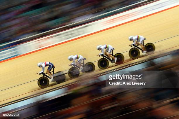 Dani King, Elinor Barker, Joanna Rowsell and Laura Trott of Great Britain in action on their way to setting a new world record time of 4:23.910...