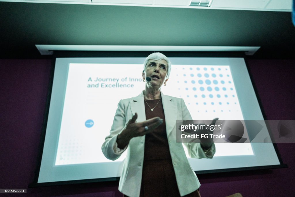Business woman doing presentation during conference