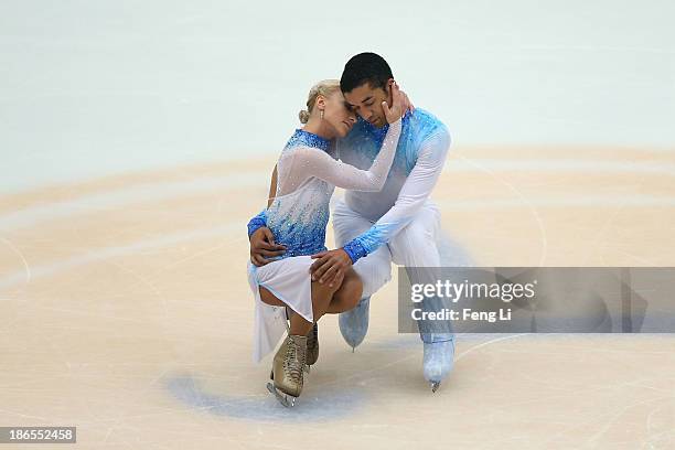 Aliona Savchenko and Robin Szolkowy of Germany skate in the Pairs Short Program during Lexus Cup of China ISU Grand Prix of Figure Skating 2013 at...