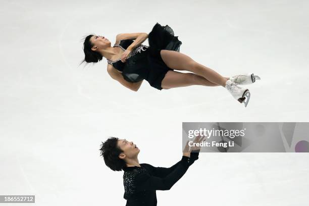 Qing Pang and Jian Tong of China skate in the Pairs Short Program during Lexus Cup of China ISU Grand Prix of Figure Skating 2013 at Beijing Capital...
