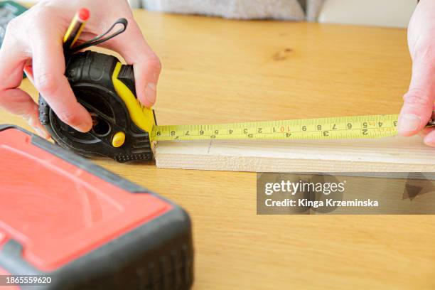 measuring tape - metro unidad de medida fotografías e imágenes de stock