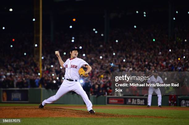 Koji Uehara of the Boston Red Sox pitches against the St. Louis Cardinals in the ninth inning of Game Six of the World Series on October 30, 2013 at...