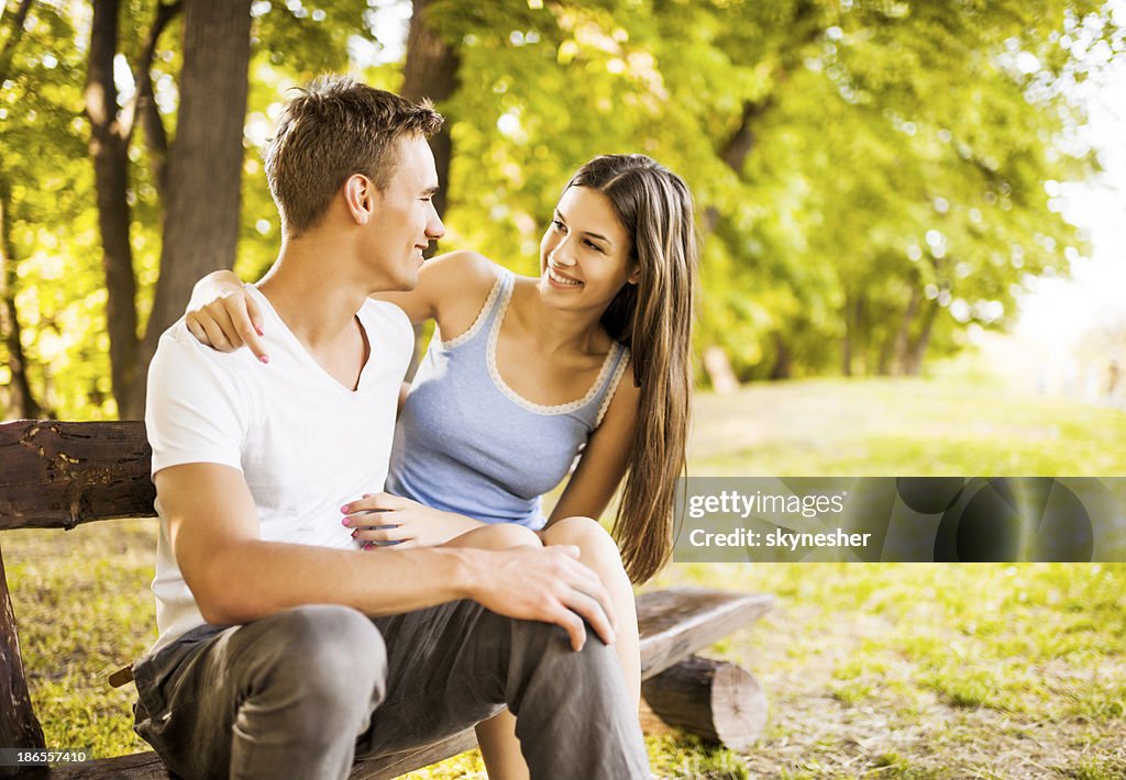 Cheerful young couple in nature.