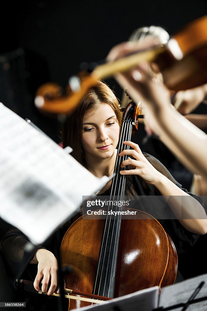 Female cellist.