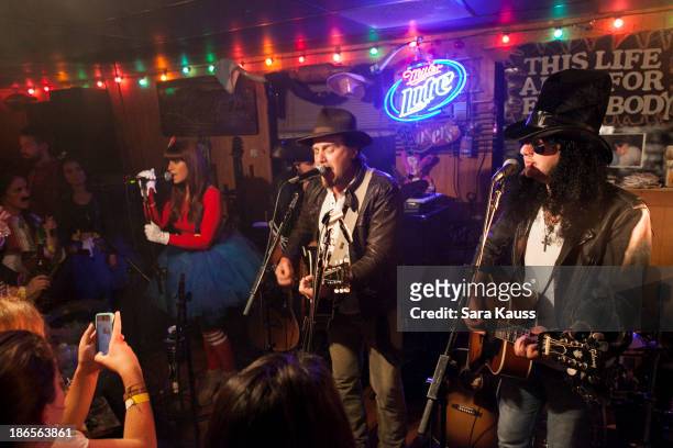 Rachel Reinert, Tom Gossin, Mike Gossin, perform at the T.J. Martell Foundation's Battle for the Bones for the Linds Sarcoma Fund at Losers Bar &...