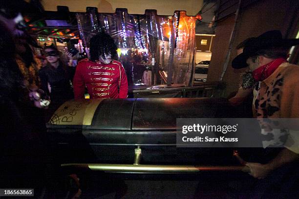 The atmosphere at the T.J. Martell Foundation's Battle for the Bones for the Linds Sarcoma Fund at Losers Bar & Grill on October 31, 2013 in...