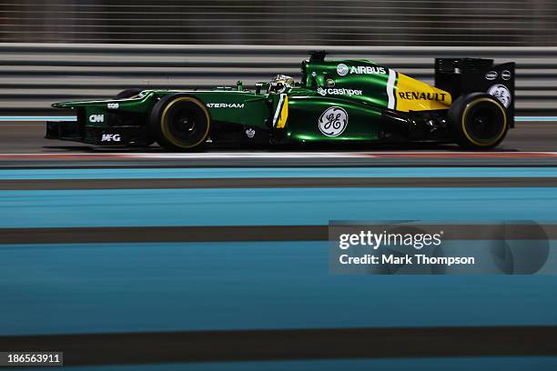 Charles Pic of France and Caterham drives during practice for the Abu Dhabi Formula One Grand Prix at the Yas Marina Circuit on November 1, 2013 in...