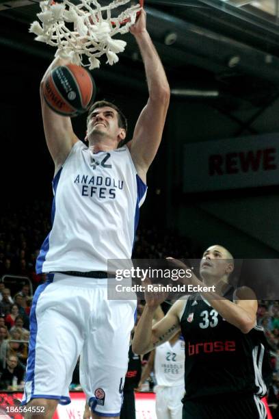 Stanko Barac, #42 of Anadolu Efes Istanbul in action during the 2013-2014 Turkish Airlines Euroleague Regular Season Date 3 game between Brose...